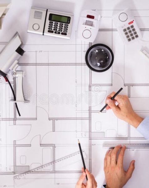 consultants-planning-project-blueprint-various-security-equipments